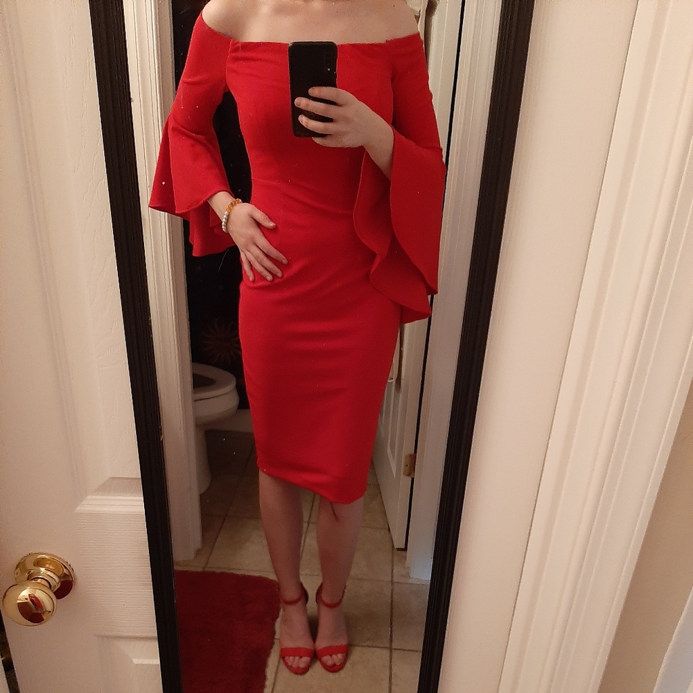 Bright red cocktail dress with dramatic sleeves
